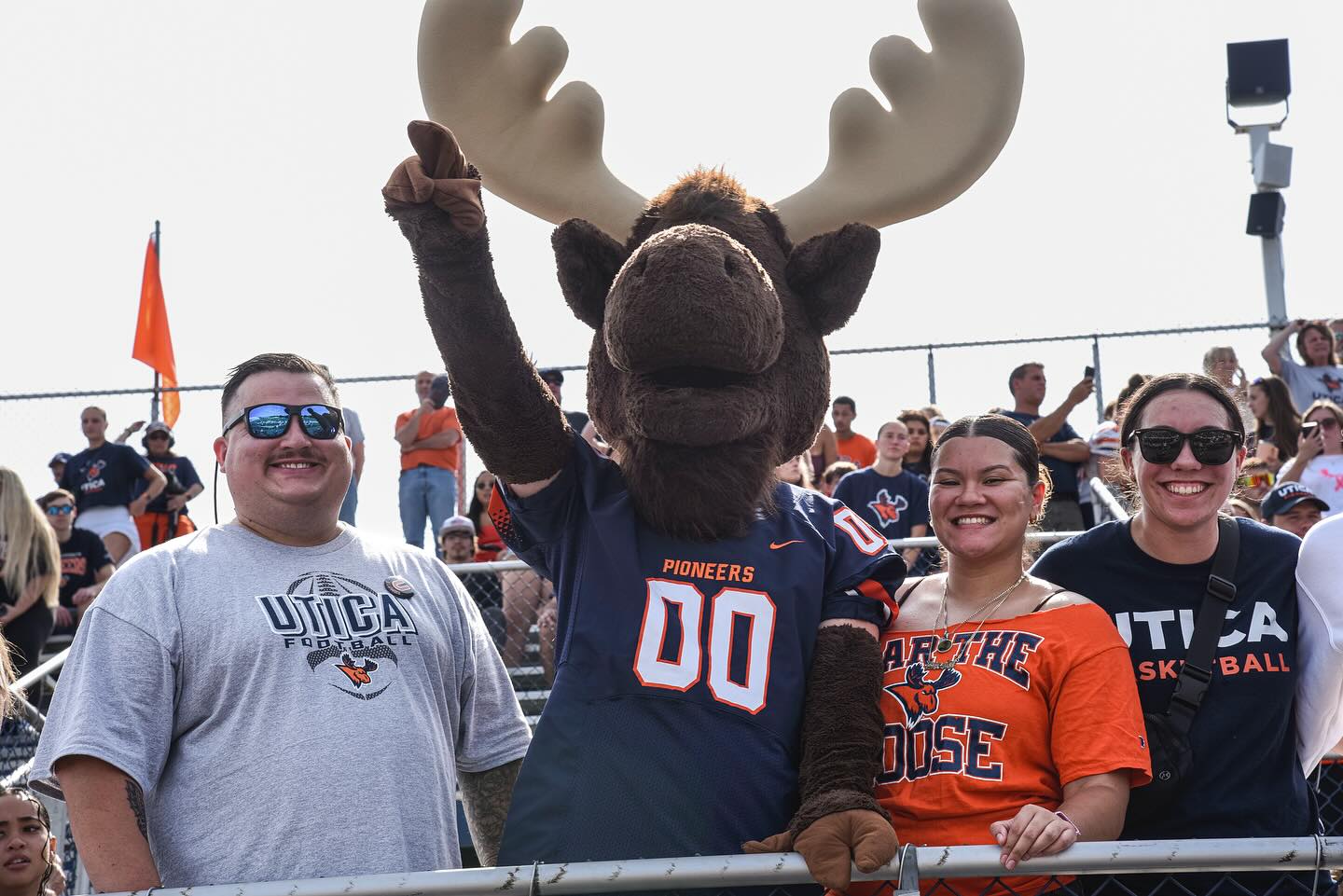 Alex Hodkinson with Trax in bleachers at Homecoming 2025