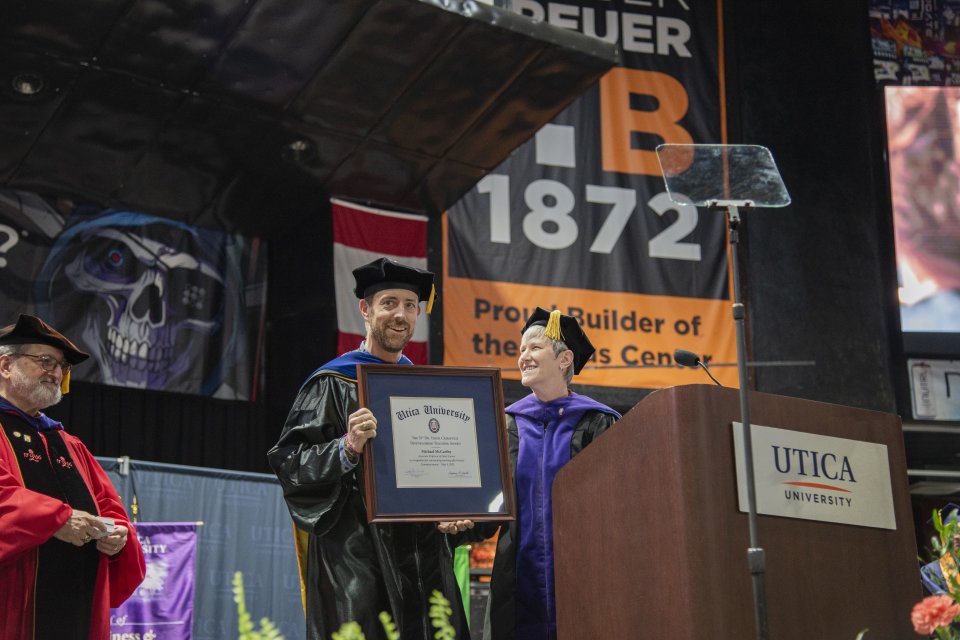 Dr Michael McCarthy receives the 2025 Crisafulli Award at the Undergraduate Commencement Ceremony.